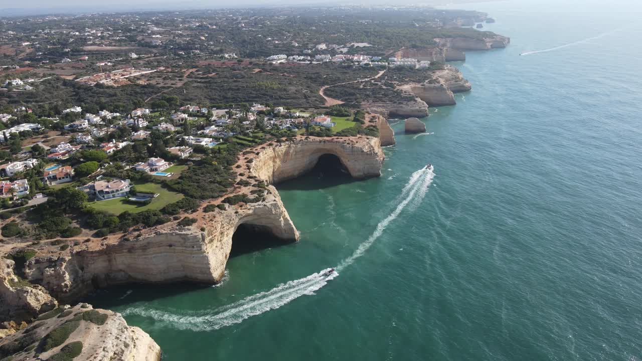 Touristic boats off the coast of Lagos in the Algarve region