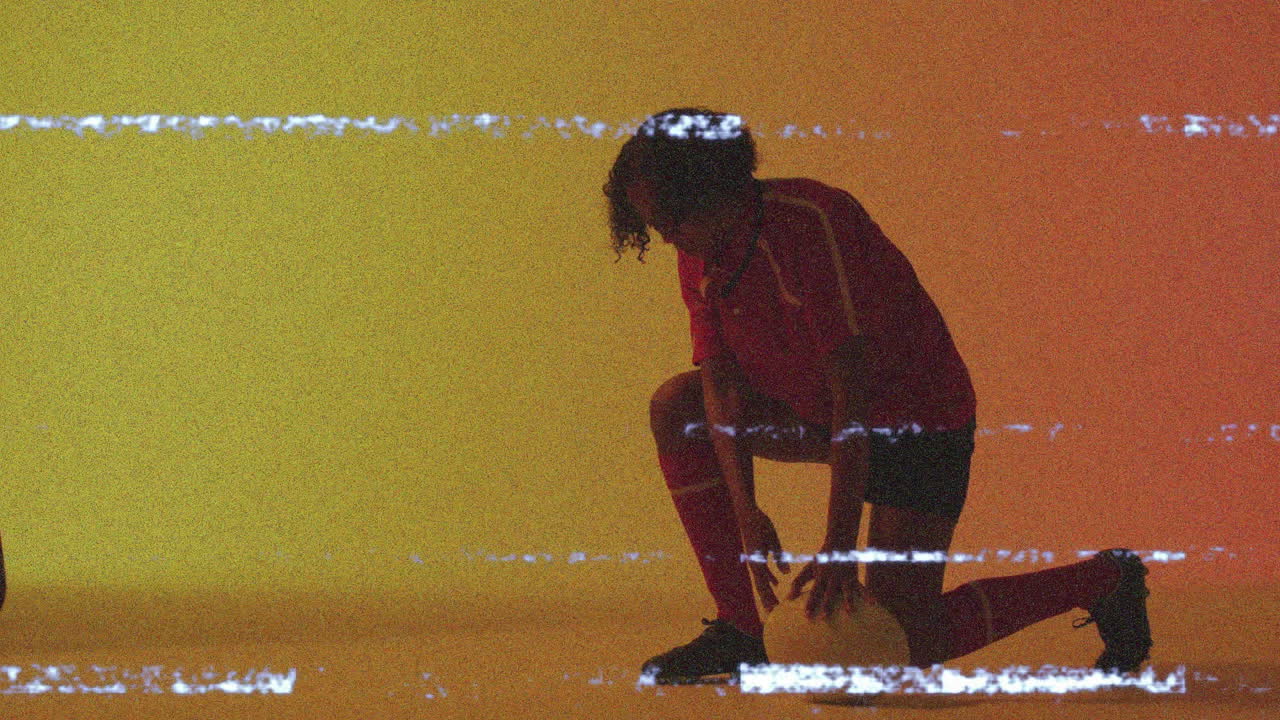 Kneeling with soccer ball, athlete in animation effect on colorful background