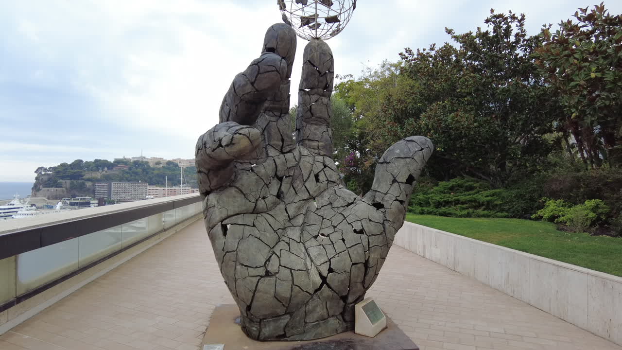 Kindly Lent sculpture by Johann Young on Boulevard Louis II in Monaco