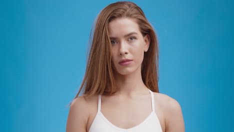 woman portrait against blue background