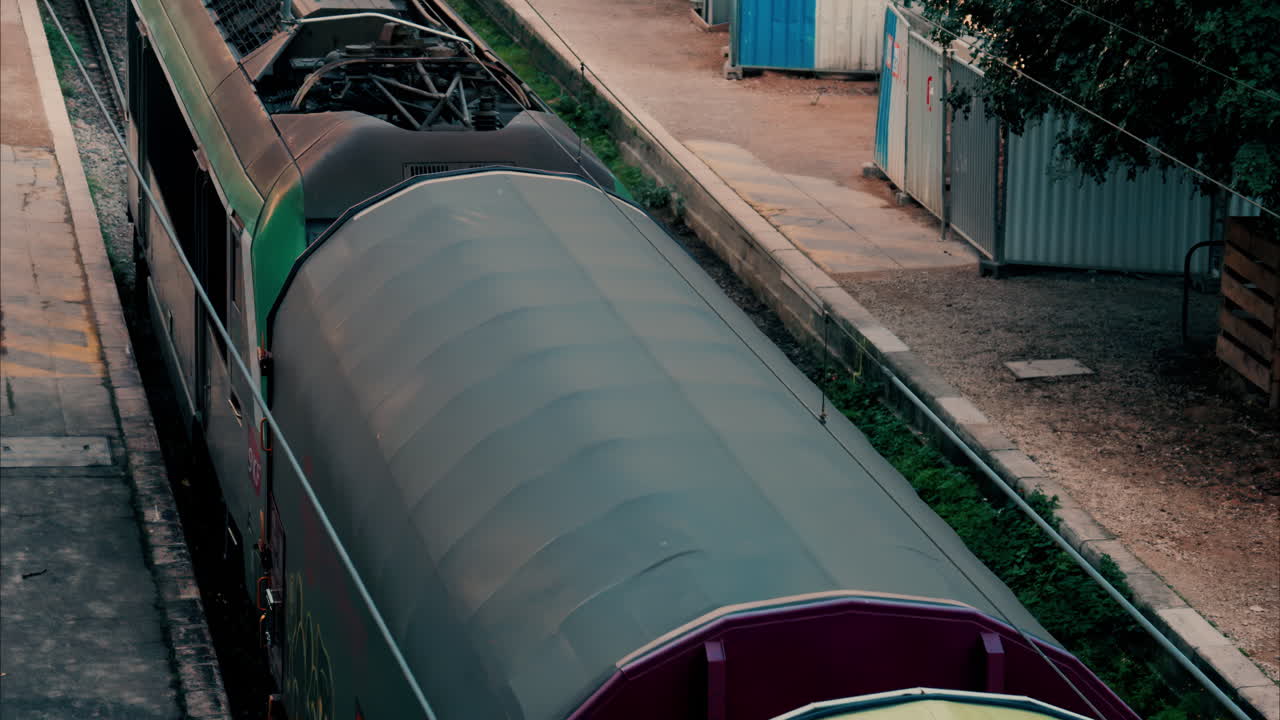 Train going moving near a beach in Villefranche sur Mer, France