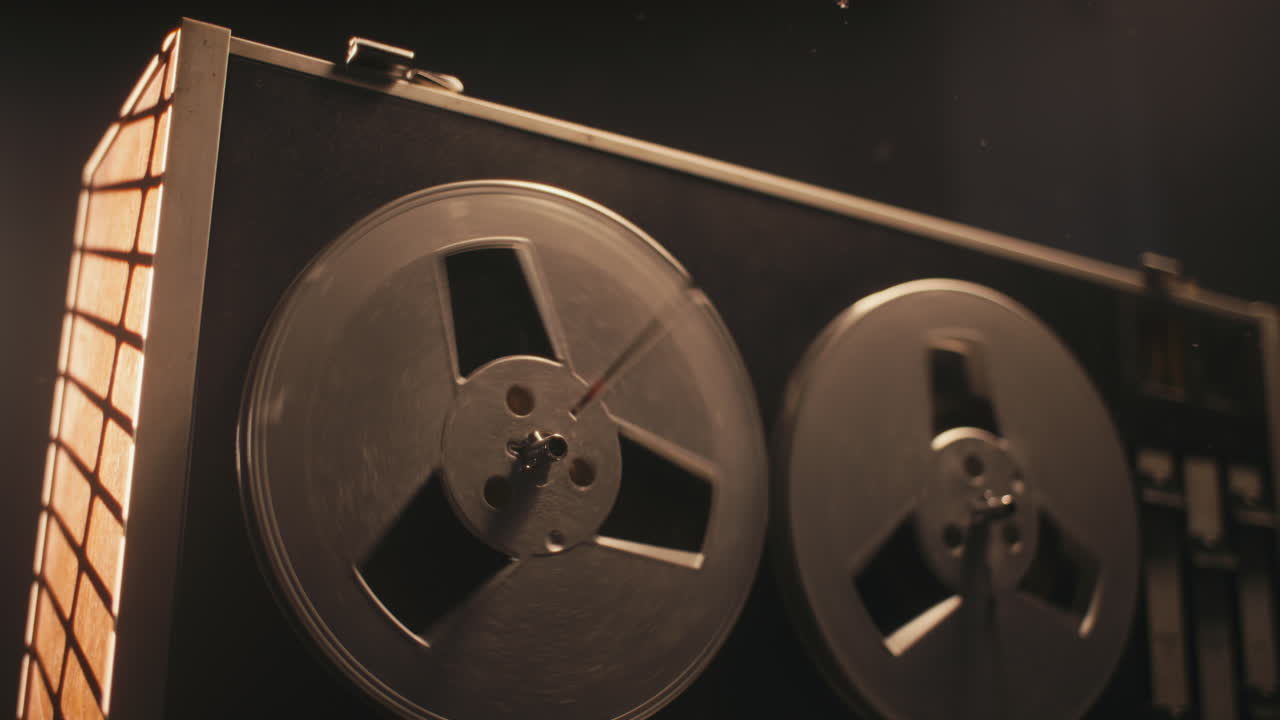 A vintage tape recorder in a blinking light