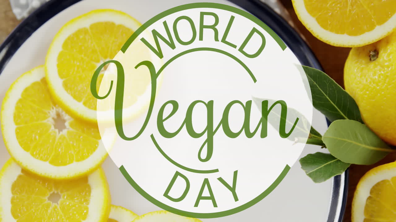 Animation of world vegan day text over fresh fruit
