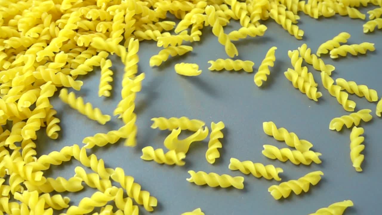 The falling fusilli pasta. Slow motion