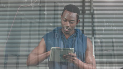 Animation-of-statistical-data-processing-over-african-american-fit-man-using-digital-tablet-at-gym