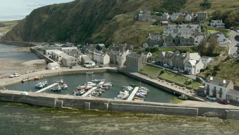 Aerial-view-of-the-Gardenstown-on-the-Aberdeenshire-coastline-on-a-summer-day