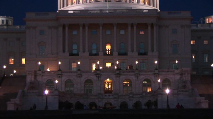The Camera Slowly Pans Up The Capitol Building To The Beautiful Capitol Dome With The Eagle Statue On Top