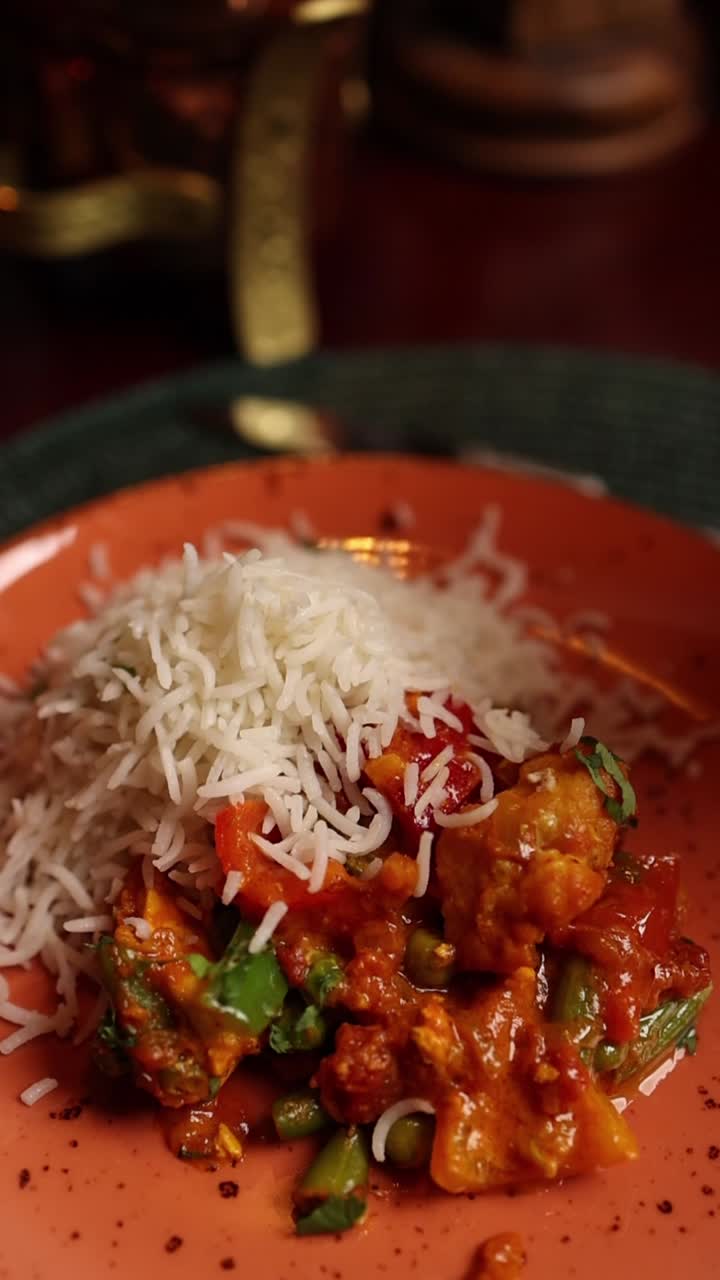A plate of rice and curry