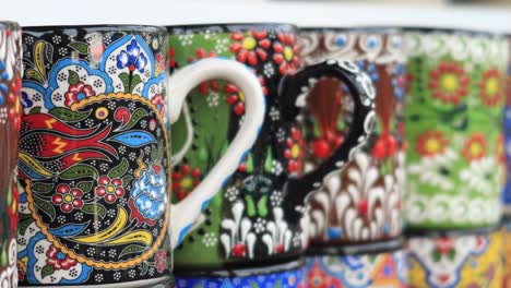 assortment of colorful hand-painted turkish coffee cups