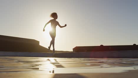 ballet dancer practicing on rooftop