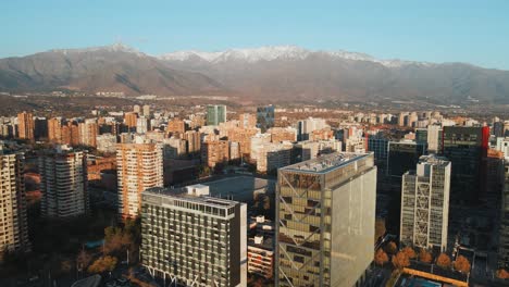 panoramic cityscape of las condes in santiago, chile with picturesque view of the andes mountain range