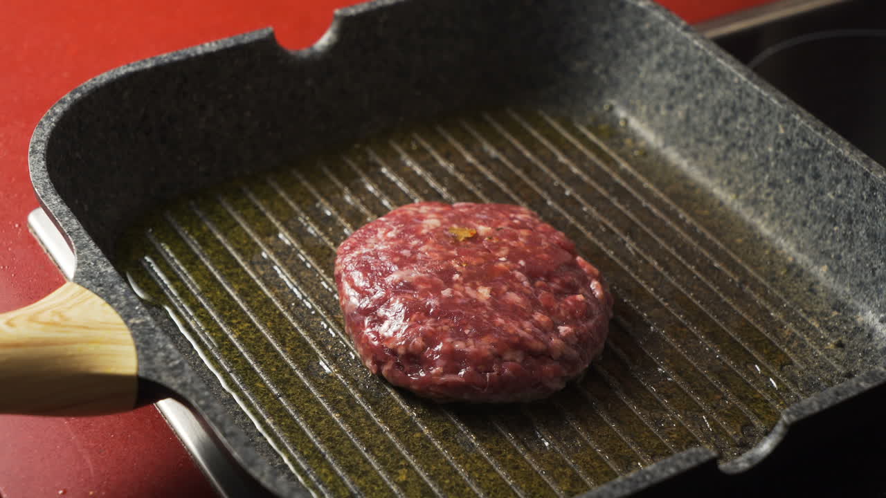 Burger patty on a grill pan