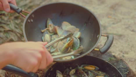 cooking mussels outdoors at campfire
