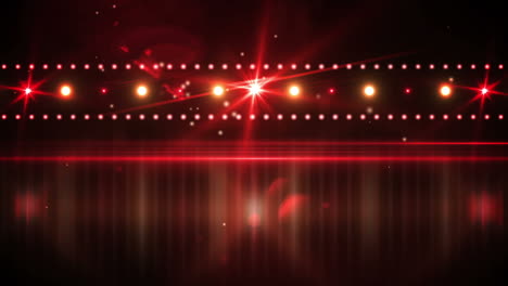 luces rojas brillando sobre un fondo negro