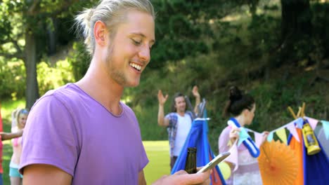 Hipster-man-smiling-and-taking-a-picture