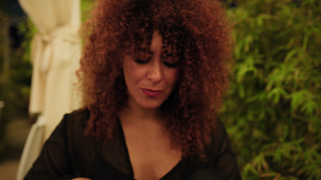 During Beach Resort Dinner A Woman Starting To Eat A Grilled Fish Appetizer