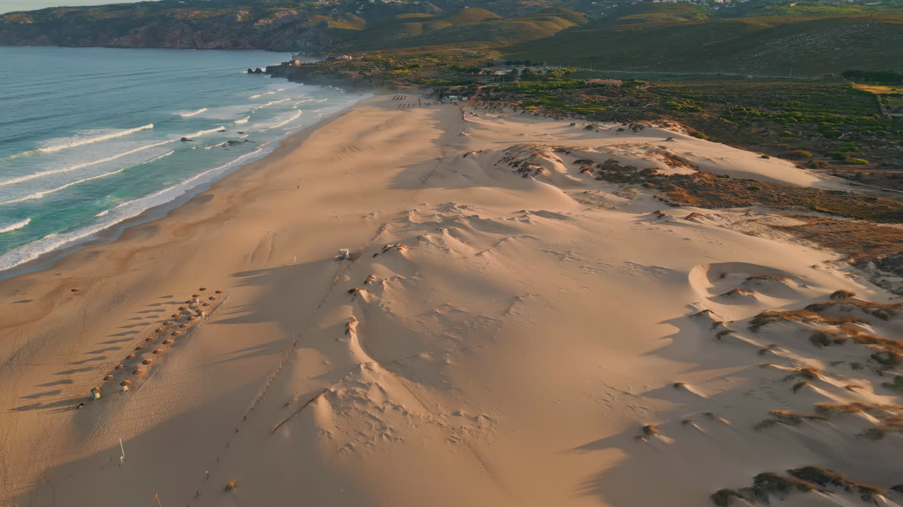 Summer ocean surf nature in slow motion. Picturesque aerial green hills beach