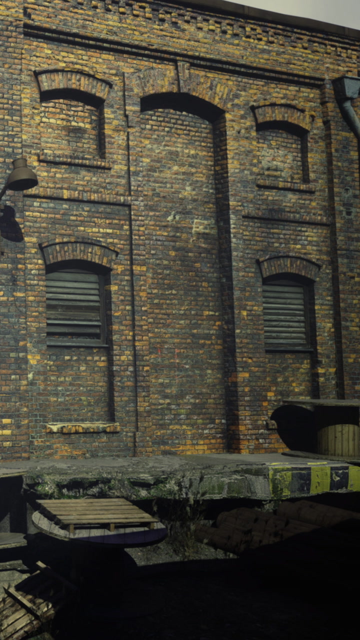 Charming old brick warehouse standing in a serene waterfront setting at dusk