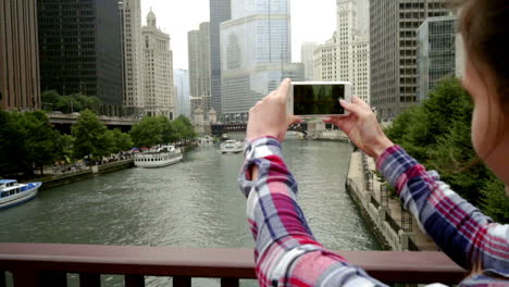 Woman-photographing-business-cityscape.-Woman-photography-city-skyscrapers