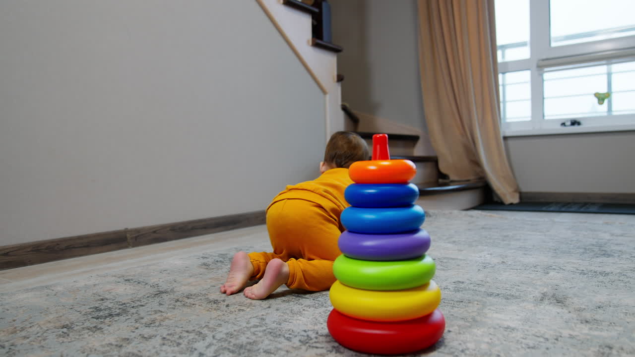 Baby Playing with Stacking Rings Toy