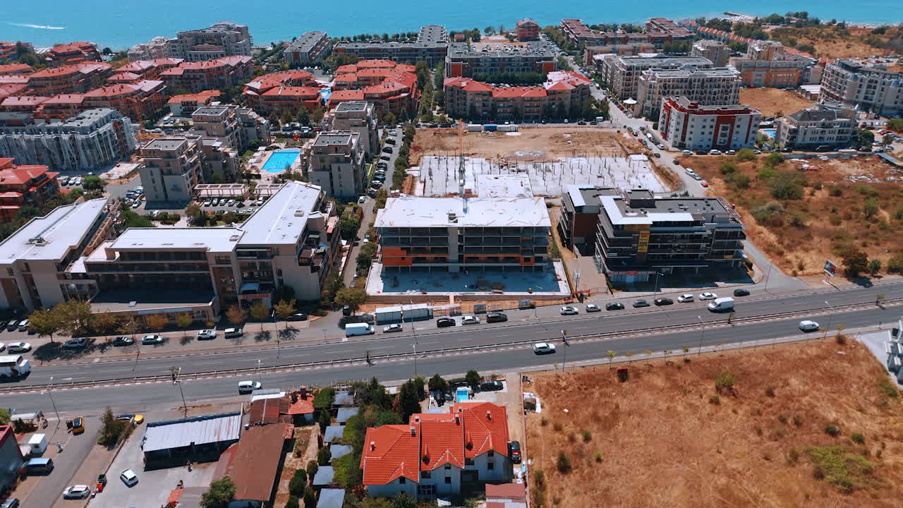 Varna, Bulgaria, 11 July 2025: Construction progress in coastal area. New building development underway in a coastal urban area with visible construction work and surrounding structures