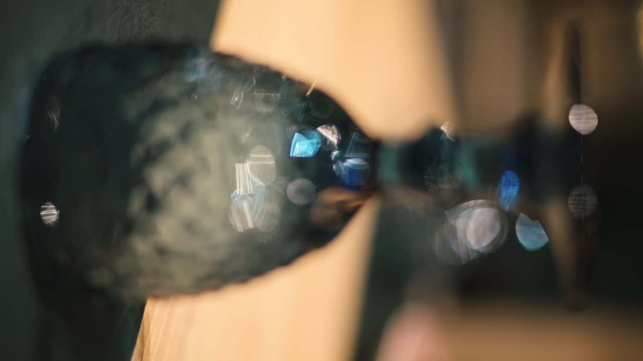 Vintage blue empty glass in a restaurant. Vertical shot