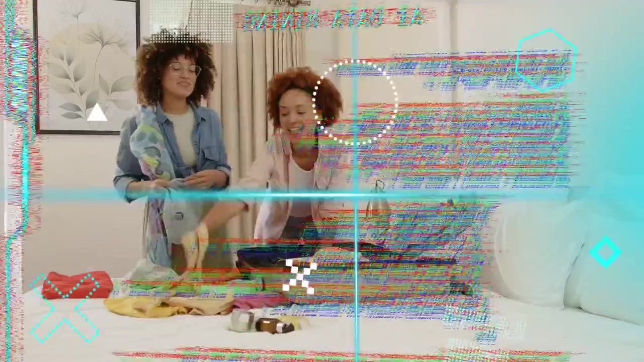 Laughter initiating two women packing clothes into open suitcase for trip while AR overlay scanning