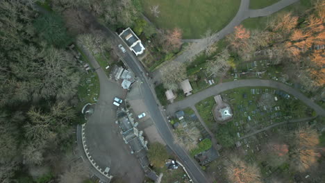 Top-down-view-of-Highgate-Cemetery-entrance-West-with-traffic-flow-next-to-Waterlow-Park-London-UK