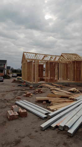 new residential houses under construction with wood framing
