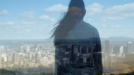 animation of cityscape over caucasian woman with arms outstretched