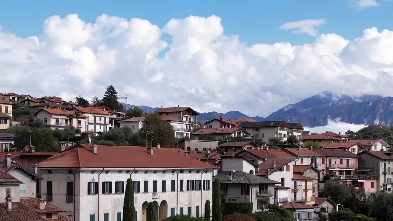 Droning over the scenic Alps in Italy reveals charming village landscapes