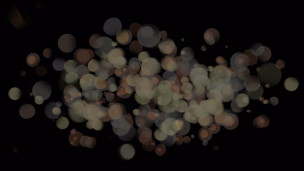 Animation of digital lens flares in seamless loop against black background