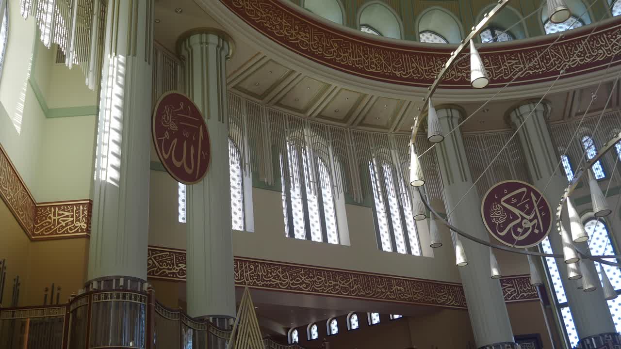 Grand Mosque Interior with Intricate Islamic Calligraphy and Architecture