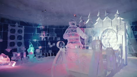 Slow-motion-jib-shot-of-frozen-icy-sleigh-inside-the-famous-snow-hotel-in-Kirkenes,-Norway