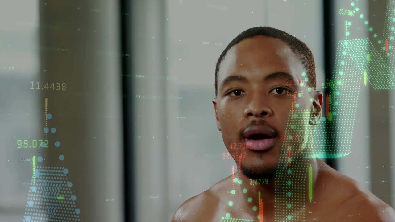 Male boxer boxing in studio in red gloves continuing punches driving sports charts overlaying torso