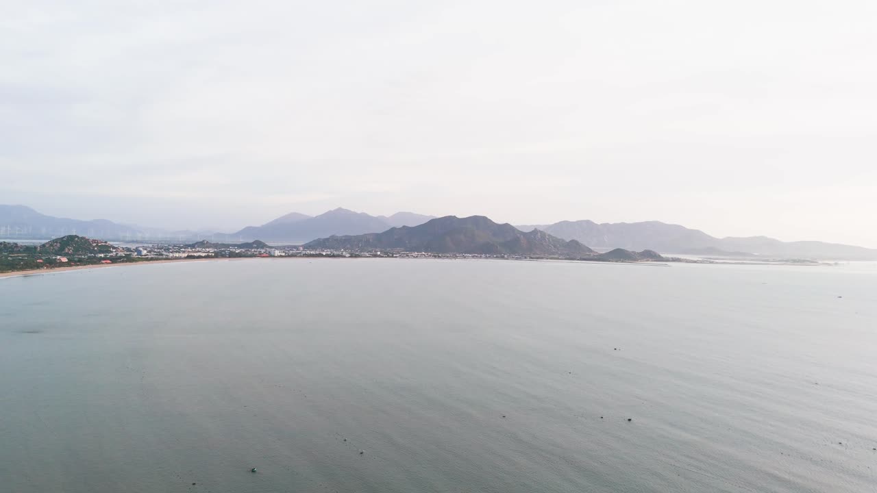 Aerial View Dolly of the Coast and the Mountains in Phan Rang–Tháp Chàm.