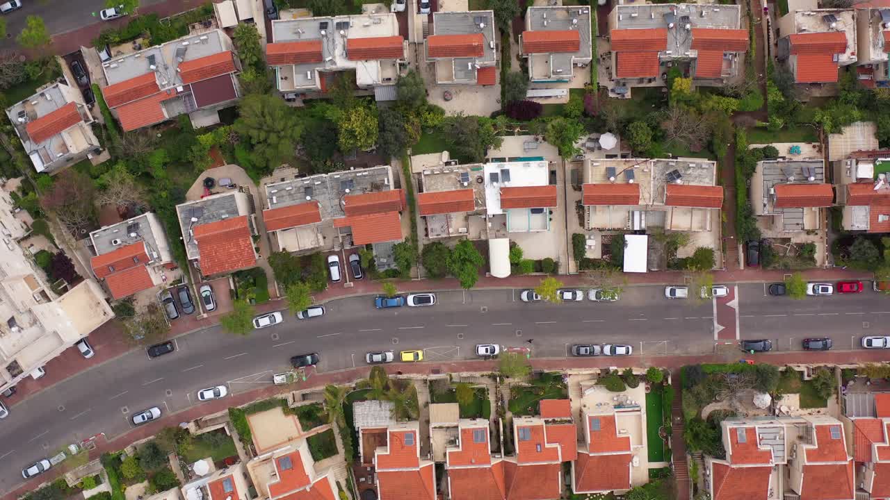 Aerial Top-Down View of a Residential Neighborhood with Houses and Street