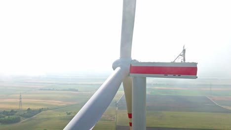 Close-Up-Of-Huge-Wind-Propeller-On-Agriculture-Farm-In-Weinviertel,-Austria---drone-shot