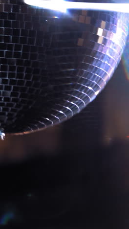 nightlife entertainment industry. close up view of reflection disco ball on party