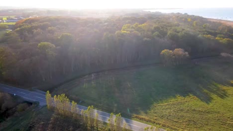 Aerial-view-of-beautiful-woods,-fields-and-coastline-in-Odsherred,-Zealand,-Denmark