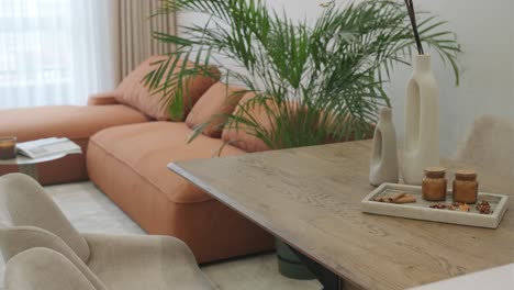 modern open-concept living and dining area with warm tones