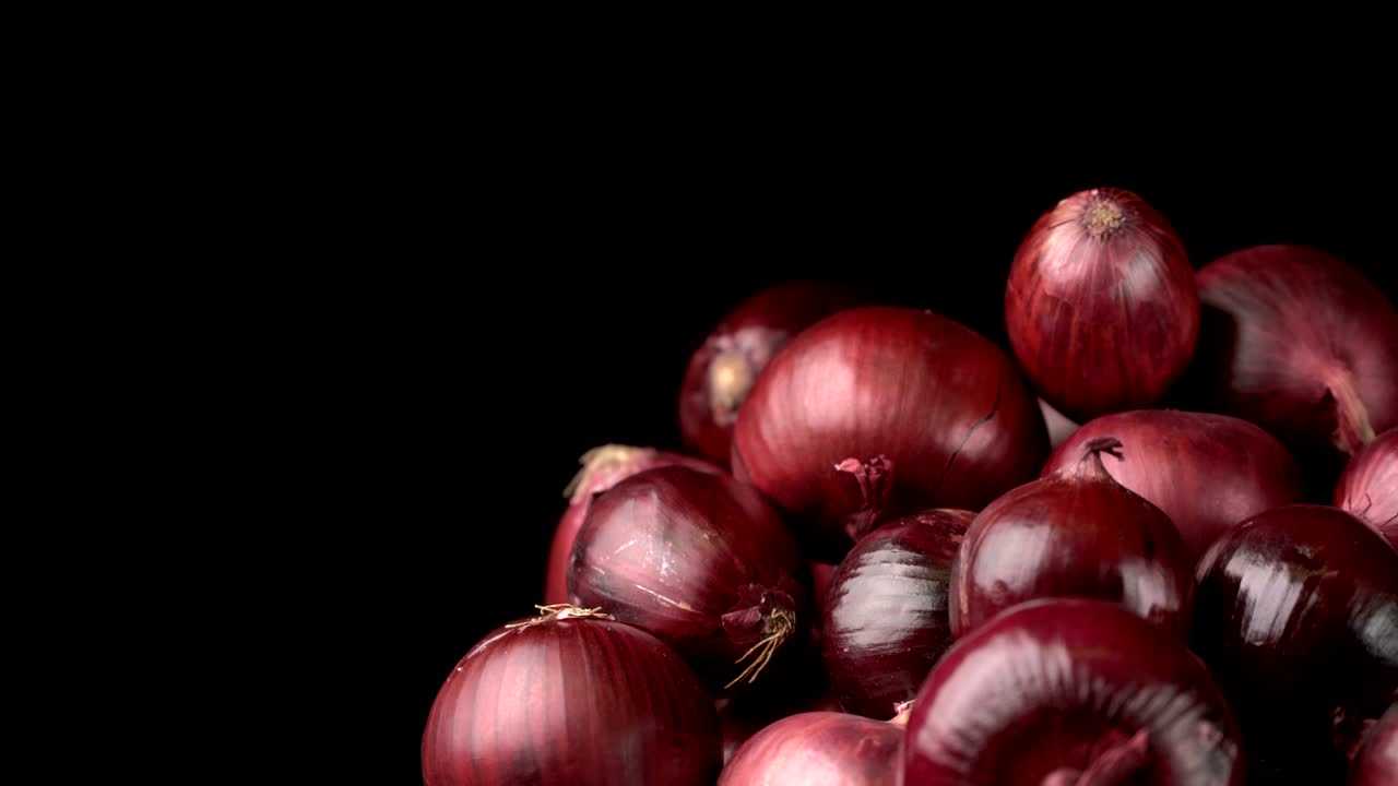 fondo de cebollas rojas giratorias