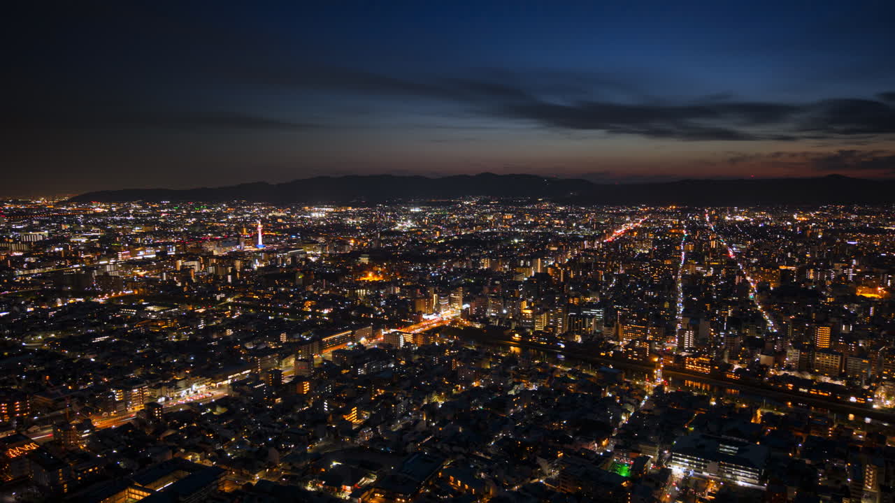 Aerial drone view of Kyoto, Japan at sunset time lapse