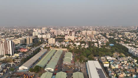 birds-eye view of an evolving cityscape with metro and mixed housing in chennai.
