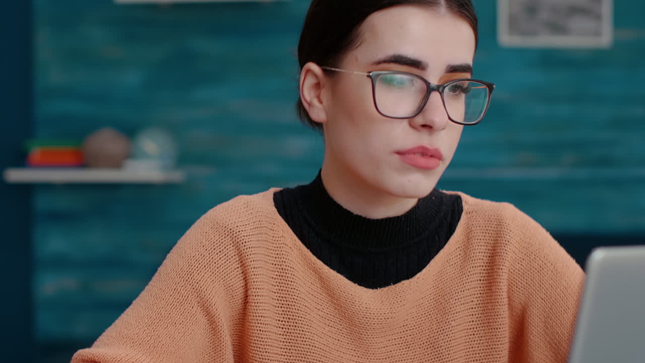 Young woman attending remote meeting on videoconference