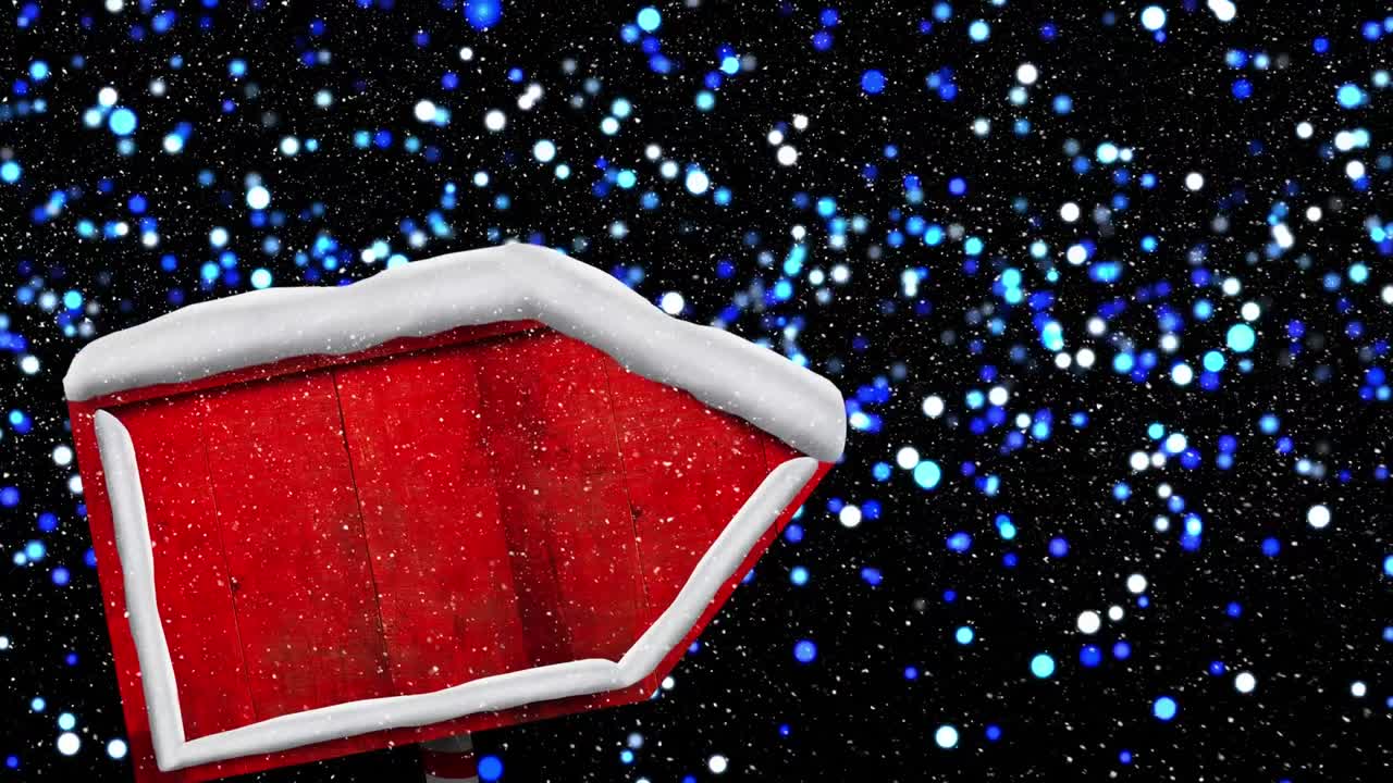 animación de nieve cayendo sobre un letrero de madera