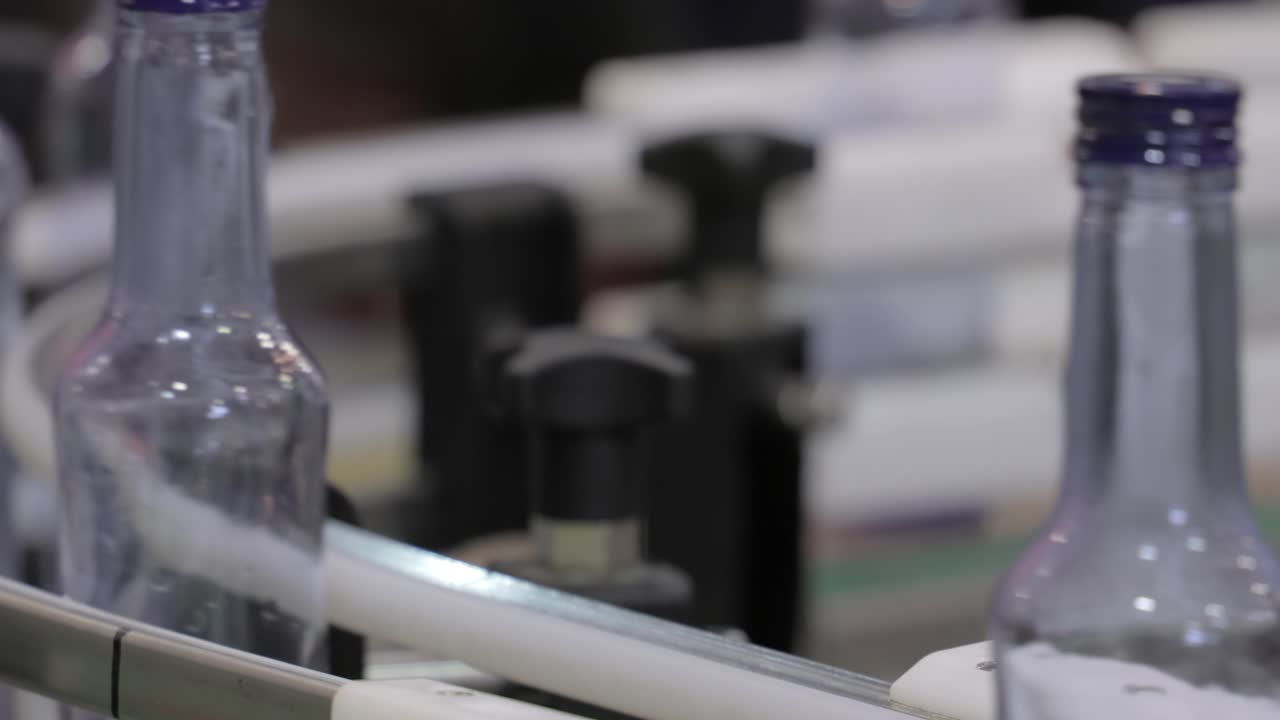 Bottles on production line plant or factory