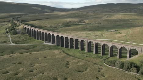 an aerial view of ribblehead viaduct in the yorhsire dales on a summer evening, england, uk