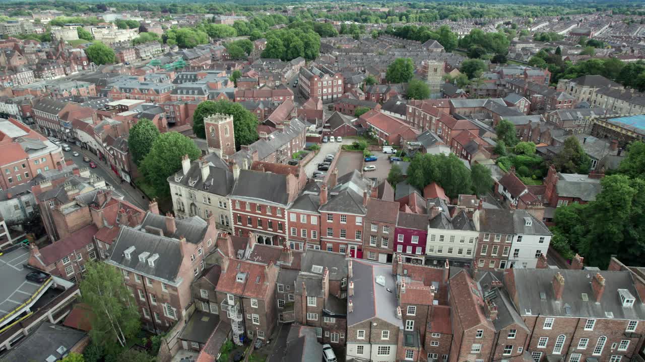 Drone view of traditional brick townhouses in historic York, England