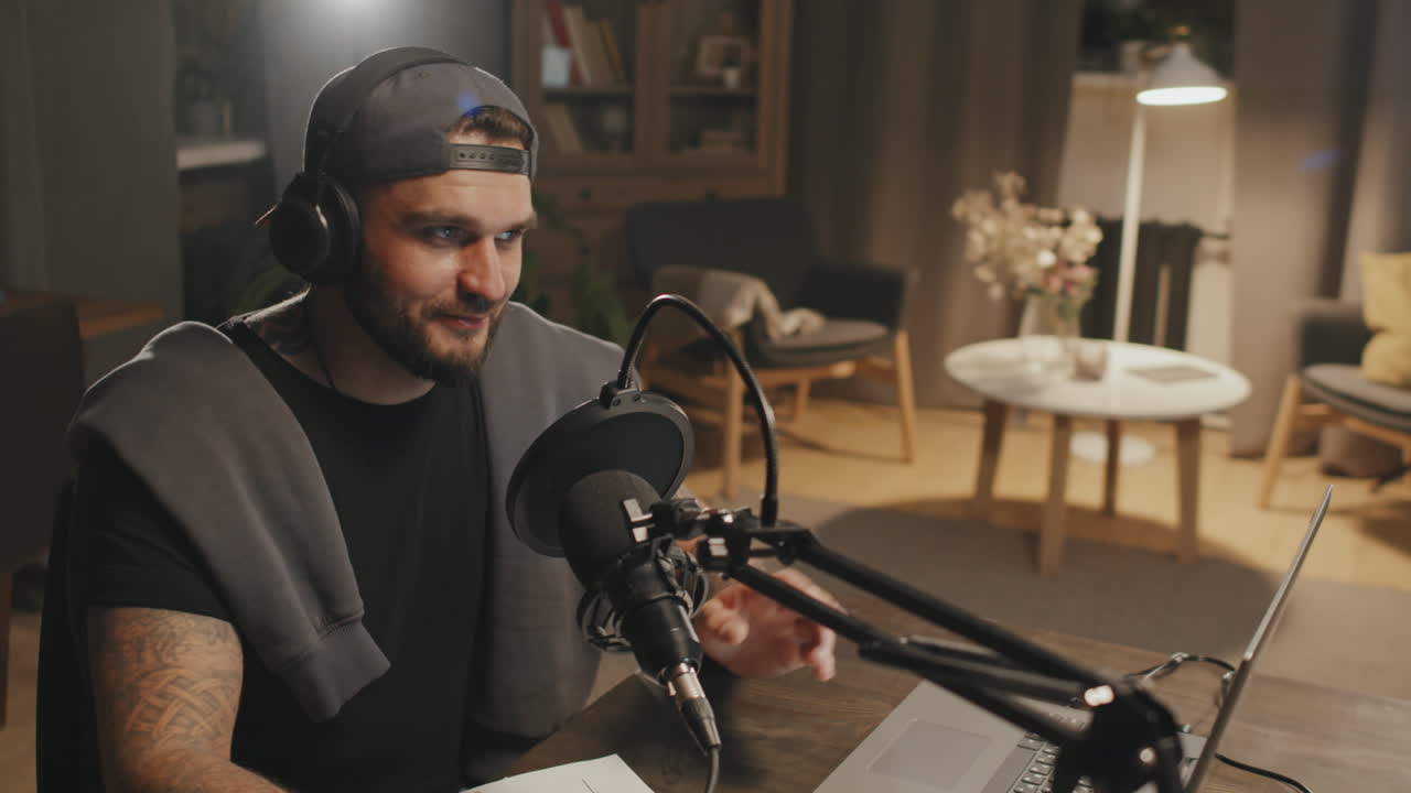 Bearded Man Recording Podcast at Home
